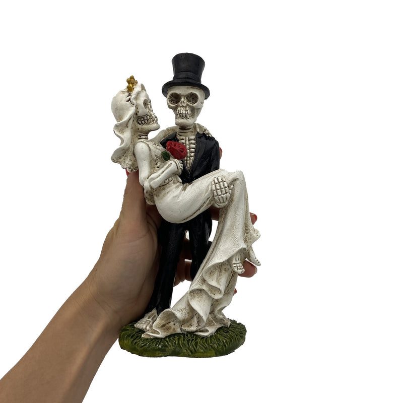 Skeleton Groom Carrying Bride Across Threshold Figurine - East Meets West USA